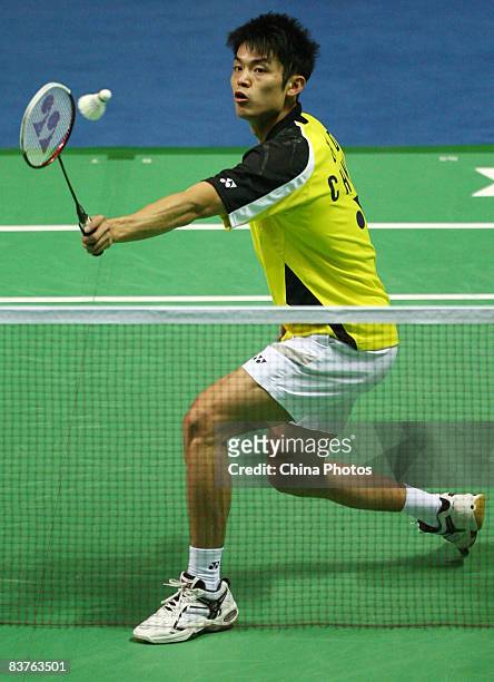 Lin Dan of China returns a shot against his compatriot Gong Weijie at the 2008 China Open BWF Super Series on November 20, 2008 in Shanghai, China....