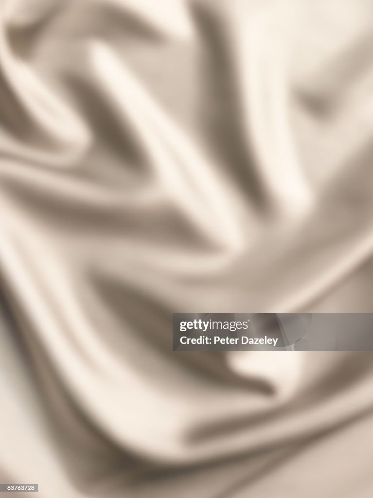 Oyster coloured silk background