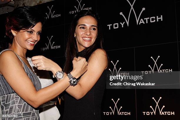 Indian actress Tara Sharma and Mandira Bedi poses at the launch of ToyWatch at Dragonfly on November 19, 2008 in Bombay, India