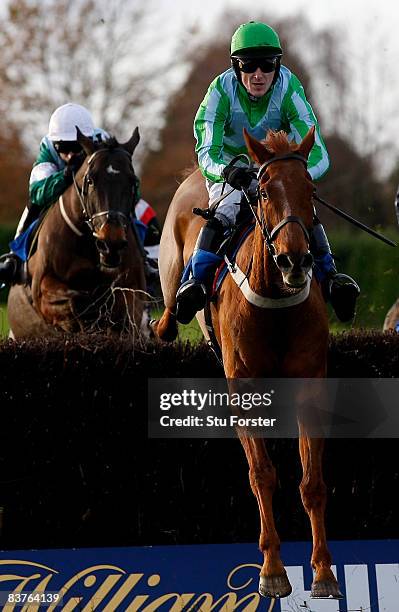 Gone to Lunch ridden by Tony McCoy clears the last fence on its way to land the Online betting with freebets.co.uk beginers' Steeple Chase at...