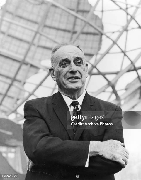 American urban planner Robert Moses , president of the World's Fair stands in front of the Unisphere monument at the World's Fair site in Flushing,...