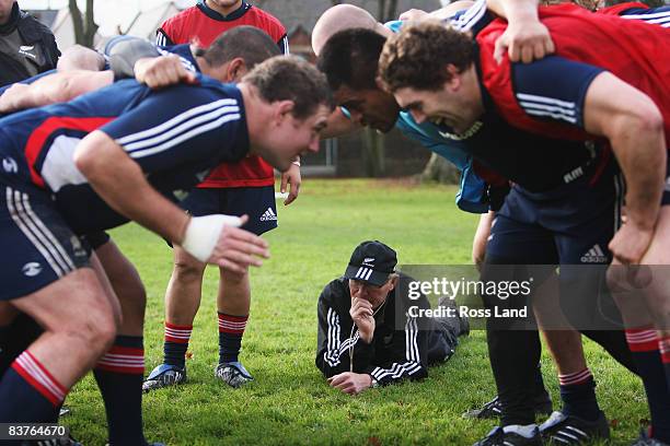 Mike Cron scrum coach of the All Blacks gets a closeup look at the scrum during a New Zealand All Black training session at Sophia Gardens on...