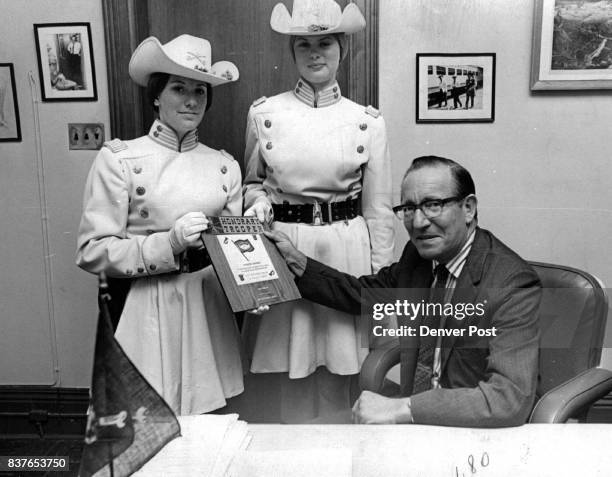 Award Presented to Post's Managing Editor by Casper Troopers Gail Jones left and Erna Lindahl color guard commanders of the Casper Troopers, Monday...