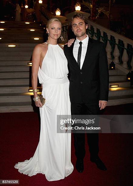 Actress Charlize Theron and Stuart Townsend attends the landmark Grand Opening of Atlantis, The Palm Resort, and the Palm Jumeirah on November 20,...