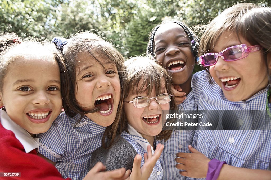 School girls laughing together