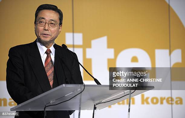 Organisation general director Kaname Ikeda delivers a speech during the temporary head office's inauguration of International Thermonuclear...