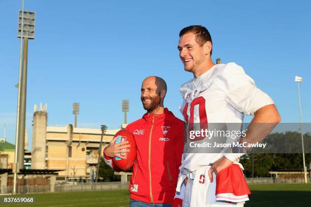 Jarrad McVeigh of the Sydney Swans and Kaeller Chryst of Stanford University look on during a US College Football Media Opportunity at Tramway Oval...