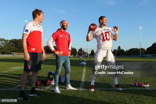 Gary Rohan, Jarrad McVeigh of the Sydney Swans and Kaeller Chryst of Stanford University during a US College Football Media Opportunity at Tramway...