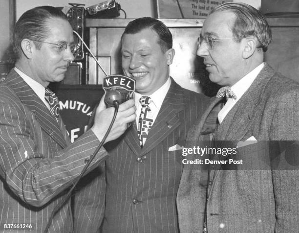 Harold Russell, Handless Veteran, is shown above with Jack Fitzpatrick of radio station KFEL, left, and Palmer Hoyt, editor and publisher of The...