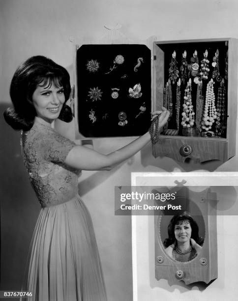 The shadow-box jewel cabinet, shown here with Nina Roman of NBC's Morningstar program, is both elegant and practical. A large mirror on the door...