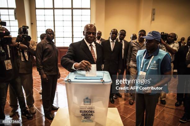 Angolan President Jose Eduardo dos Santos casts his vote in Luanda, on August 23, 2017 during the general elections. Angolans cast their ballots on...