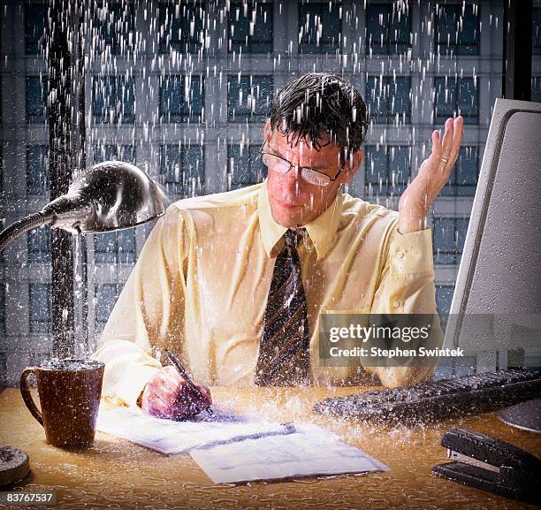 Desk Getting Rained On Gif 755 Rain Inside Office Stock Photos, High-Res Pictures, and Images ...