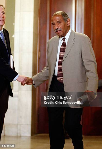 House Judiciary Committee Chairman John Conyers leaves the House Democratic Caucus meeting on Capitol Hill November 20, 2008 in Washington, DC. House...