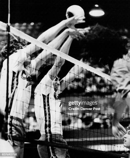 This Block Failed, But Comets Broke Breakers, Anyway Denver's Larry Benecke and Jon Stanley missed in the first game of the Comets 3-1 International...