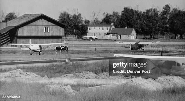 Plane In Every Driveway, Two Horses In Every Yard 'Horses‘and airplanes share many of the back yards of Brighton in Adams County, where the ultimate...