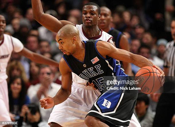 Gerald Henderson of the Duke Blue Devils dribbles the ball against Wesley Clemmons of the Southern Illinois Salukis on November 20, 2008 at Madison...