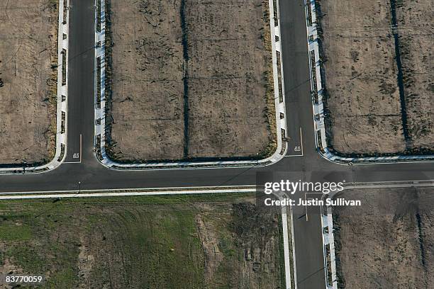 Streets and housing plots are seen vacant at a 750-home housing development where construction was halted November 20, 2008 in Rio Vista, California....