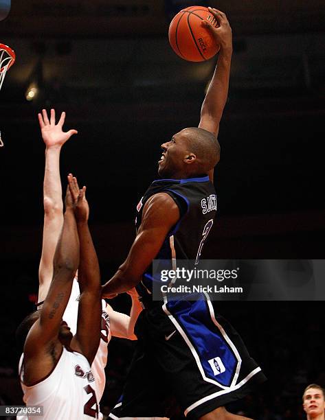 Nolan Smith of the Duke Blue Devils dunks against the Southern Illinois Salukis on November 20, 2008 at Madison Square Garden in New York City.