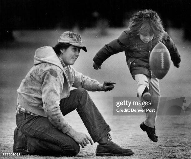 Toeing The Mark While much of the United States shivered in winter's grasp, balmy weather in Denver brought out Paul Eldridge and his son, Gabriel...