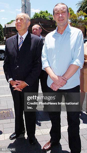 Tony Byrne, father of Caroline Byrne, and his son Peter leave Darlinghurst Court after the jury found Gordon Wood guilty of murdering his daughter on...