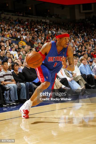 Allen Iverson of the Detroit Pistons drives to the basket during the game against the Golden State Warriors at Oracle Arena on November 13, 2008 in...