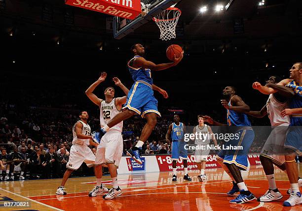 Josh Shipp of the UCLA Bruins lays the ball up against the Michigan Wolverines on November 20, 2008 at Madison Square Garden in New York City.