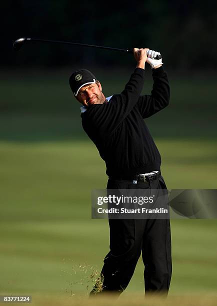 Jose Maria Olazabal of Spain plays his approach shot on the 13th hole during the second round of the UBS Hong Kong Open at the Hong Kong Golf Club on...