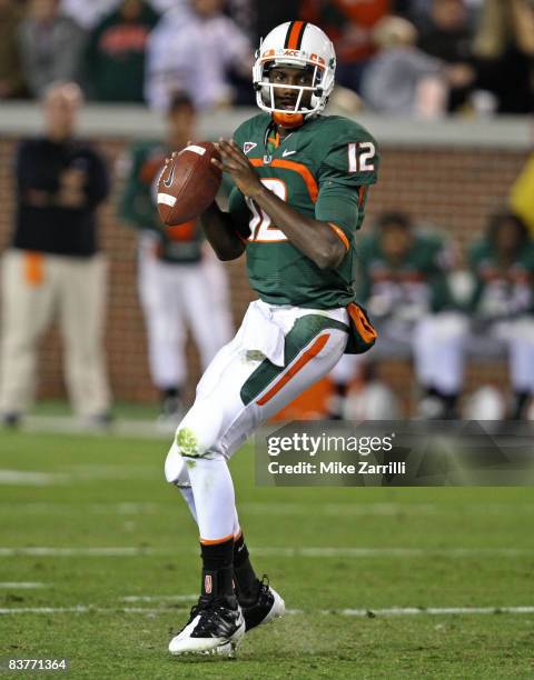 Quarterback Jacory Harris of the Miami Hurricanes drops back to pass during the game against the Georgia Tech Yellow Jackets at Bobby Dodd Stadium at...