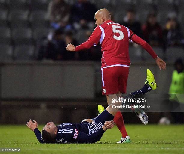 Taylor Regan of United makes contact with Mitchell Austin of the Victory during the round of 16 FFA Cup match between Adelaide United and Melbourne...