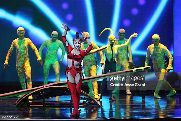 Members of Cirque du Soleil's "Mystere" perform the Korean Plank Act on stage at Ellen's Even Bigger Really Big Show during The Comedy Festival 2008...