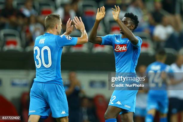 Marko Rog of Napoli and Amadou Diawara of Napoli celebrate during the UEFA Champions League Qualifying Play-Offs round, second leg match, between OGC...