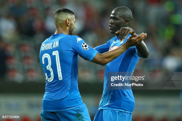 Faouzi Ghoulam of Napoli and Kalidou Koulibaly of Napoli celebrate after the UEFA Champions League Qualifying Play-Offs round, second leg match,...