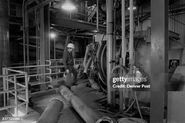 Norman aA. Jangaard in the high-fructose corn Syrup production facility at Johnstown, Colo. Jangaard is president of Coors Bio Tech Products.****...