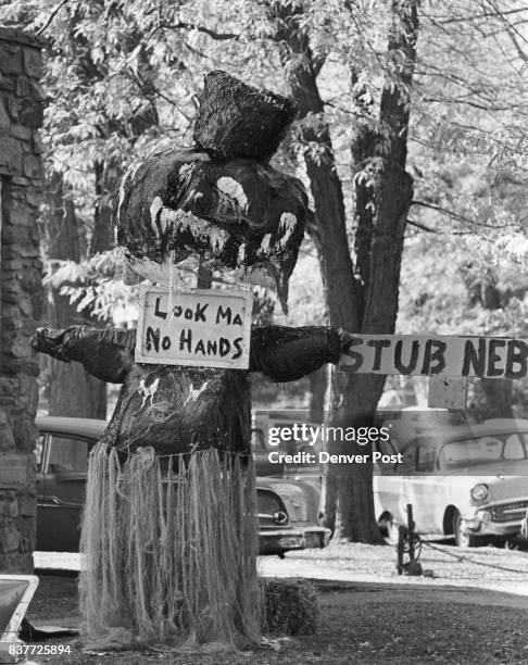 Must Be Trying to Scare Nebraska This ogre, in hula skirt and "no hands," must have been designed to put a scare into the University of Nebraska team...