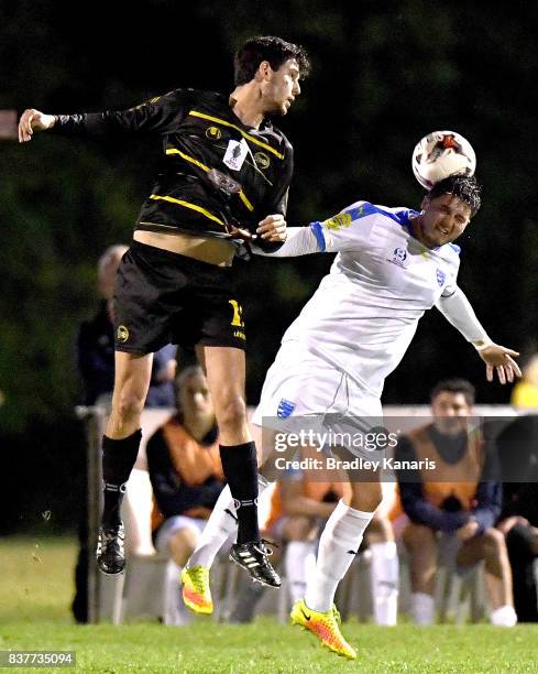 Martin Vasquez Gold Coast City and Corey Lucas of Moreton Bay compete for the ball during the FFA Cup round of 16 match between Moreton Bay United...