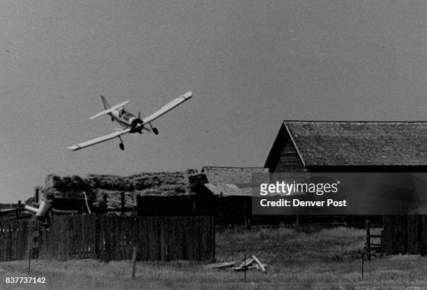 The great Waldo pepper heading for a barn?" With a long lens the plane seems to be heading for the barn that sits iron a small hill Crop duster in...