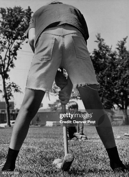 Croquet Is Oquet for Summer Fun A popular warm weather diversion these days-in Aurora City Park is the ancient game Of croquet. Danny Shindle with...