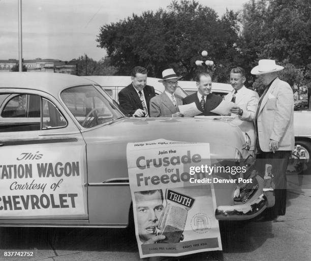 Attending ceremonies at which three new Chevrolet station wagons were delivered through the courtesy of the Chevrolet division of the General Motors...