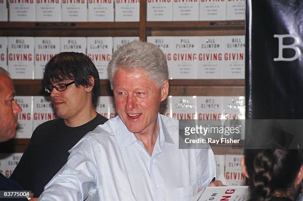 Former US President Bill Clinton at a book signing session for his new book 'Giving,' at an independent bookstore 'Books & Books,' Coral Gables,...