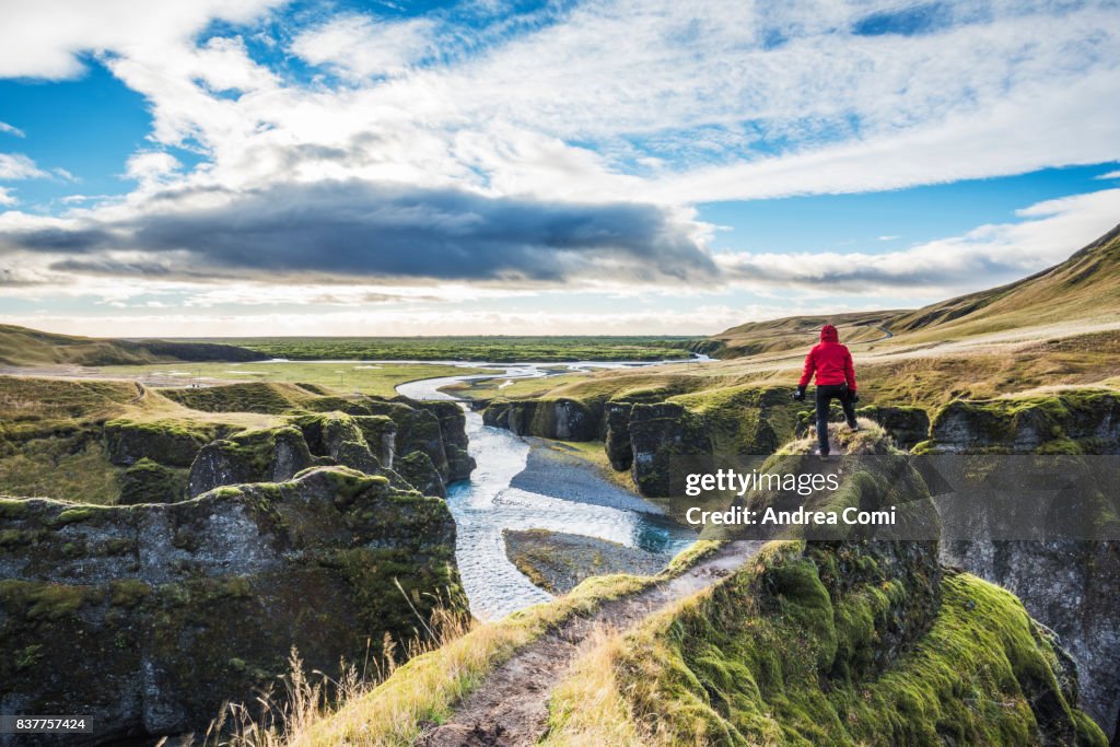 Fjadrargljufur, Iceland, Europe. A man admires the panorama