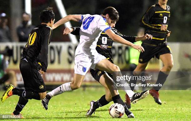 Jason Campbell of Gold Coast City takes on the defence during the FFA Cup round of 16 match between Moreton Bay United and Gold Coast City at Wolter...