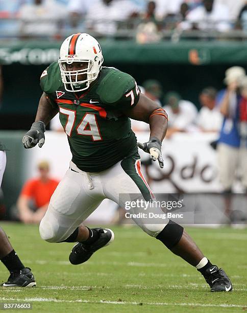 Offensive lineman Orlando Franklin of the Miami Hurricanes drops back to block while taking on the Wake Forest Demon Decons at Dolphin Stadium on...