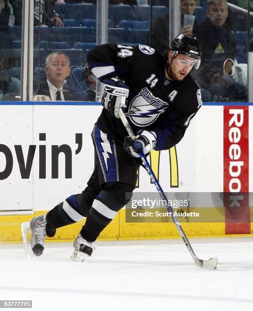 Andrej Meszaros of the Tampa Bay Lightning skates with puck against the Florida Panthers at the St. Pete Times Forum on November 18, 2008 in Tampa,...