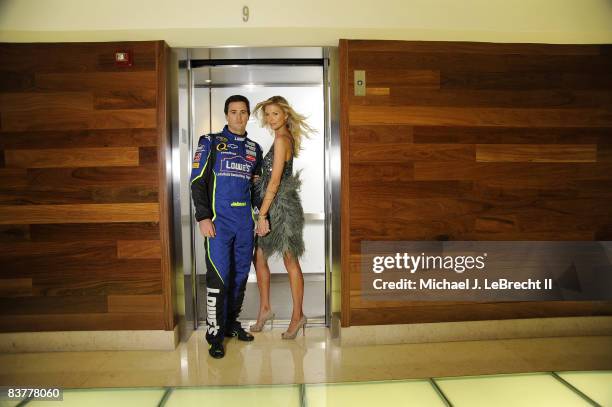 Driver Jimmie Johnson and his wife Chandra Johnson are photographed for Sports Illustrated on November 12, 2008 at the Gansevoort South Hotel in...