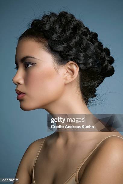 woman with braided hair, profile. - braid hairstyle stock pictures, royalty-free photos & images
