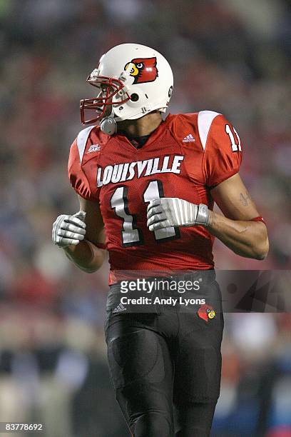 Greg Scruggs of the Louisville Cardinals jogs on the field during the Big East Conference game against the Cincinnati Bearcats on November 14, 2008...