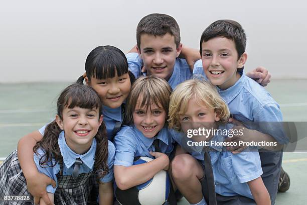 school children in group photo - 私立学校 ストックフォトと画像