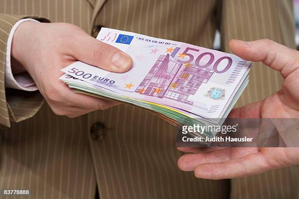 transferring money-notes - exchanging money stock pictures, royalty-free photos & images