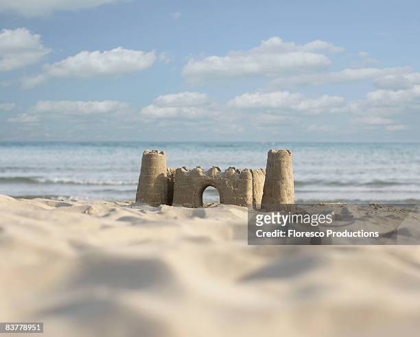 sandcastle by the beach - castillo de arena fotografías e imágenes de stock