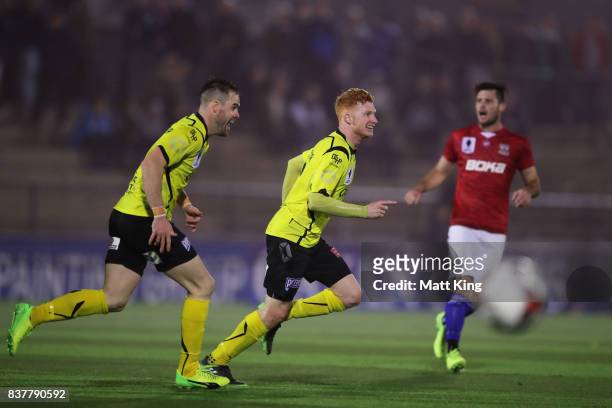 Sean Ellis of Heidleberg United celebrates scoring a goal in extra time during the FFA Cup round of 16 match between Sydney United 58 FC and...
